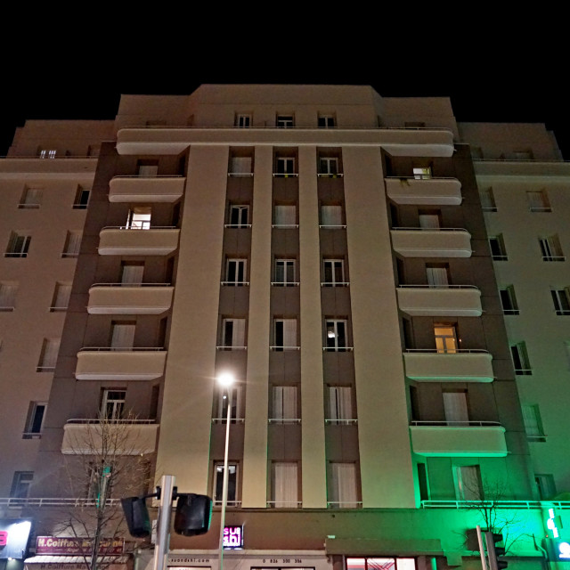 "art deco building at night" stock image