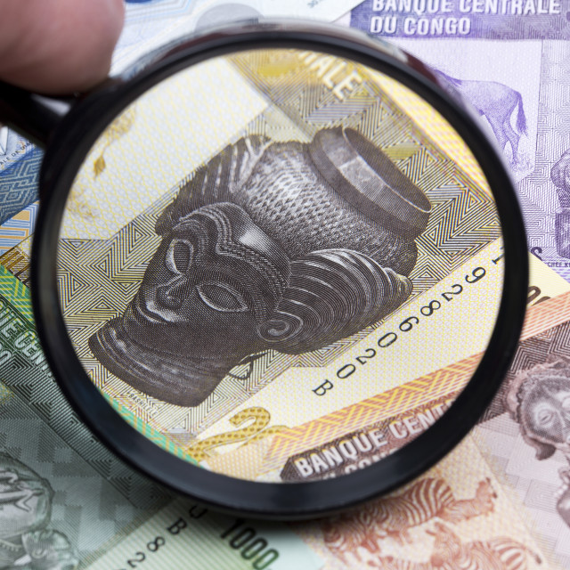 "Congolese franc in a magnifying glass" stock image