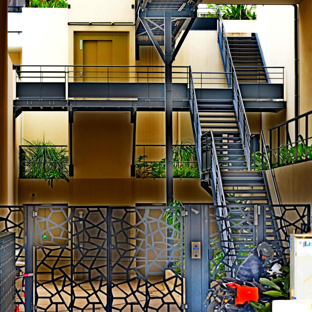 "an entrance to a building" by Amit Mendelsohn - $49.60 "an entrance to a building" stock image