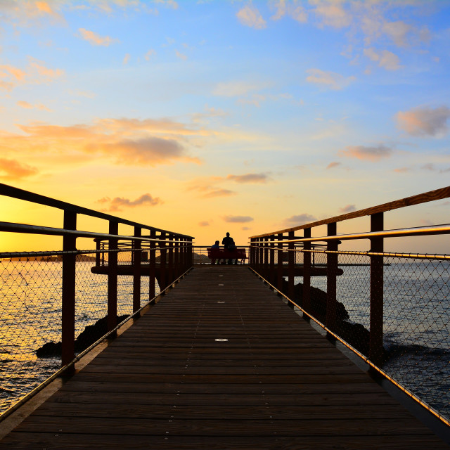 "A sunset in front of the sea" by Amit Mendelsohn - $48.98 "A sunset in front of the sea" stock image