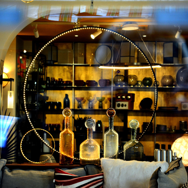 "bottles in a vitrine" by Amit Mendelsohn - $48.98 "bottles in a vitrine" stock image