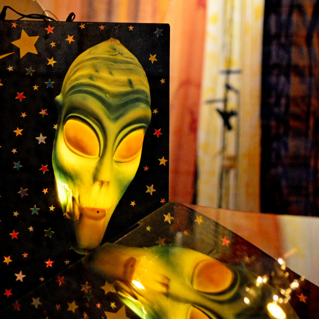 "an alien mask reflecting" by Amit Mendelsohn - $48.98 "an alien mask reflecting" stock image