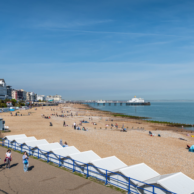 "The beach and promenade with the Pier in the background, Eastbourne, England" stock image