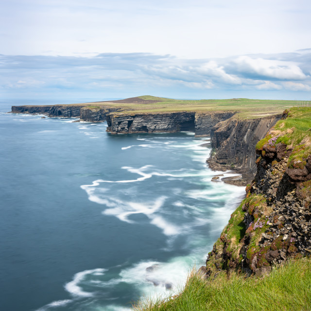 "Atlantic Ocean Waves Crashing onto the Cliffs of Loophead Peninsula, County Clare, Ireland" stock image