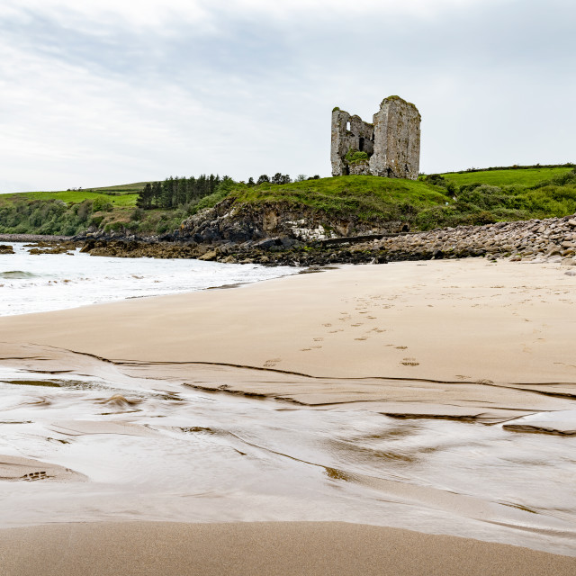 "The remains of Minard Castle from Minard Beach, County Kerry, Ireland" stock image