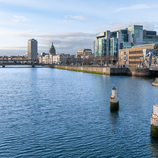 "The River Liffey through Dublin, Ireland looking upstream from the Sean Casey Footbridge" stock image