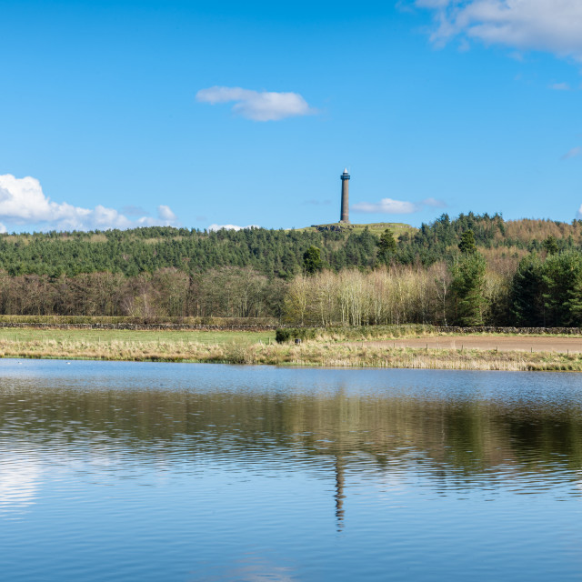 "The Waterloo Monument reflected in Folly loch near Jedburgh" stock image