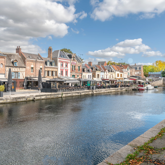 "The riverbank cafes by the River Somme, Amiens, France" stock image