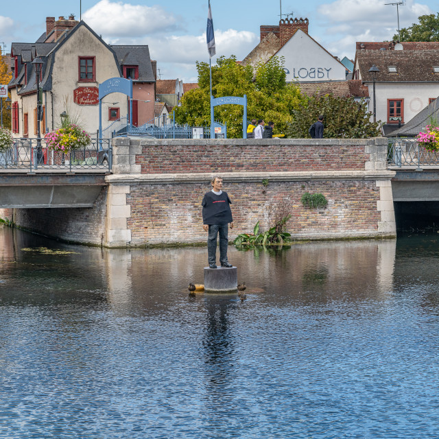 "Artistic Statue L'Homme sur sa bouee in the River Somme, Amiens, France" stock image