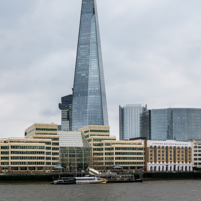 "The Shard Tower with London Bridge Hospital on the South bank of the River Thames, London, England" stock image