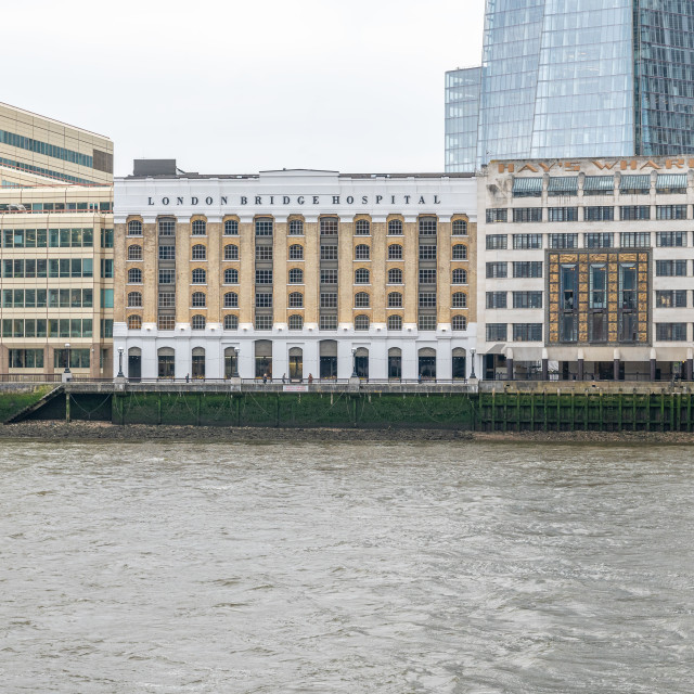 "London Bridge Hospital on the South bank of the River Thames, London, England" stock image