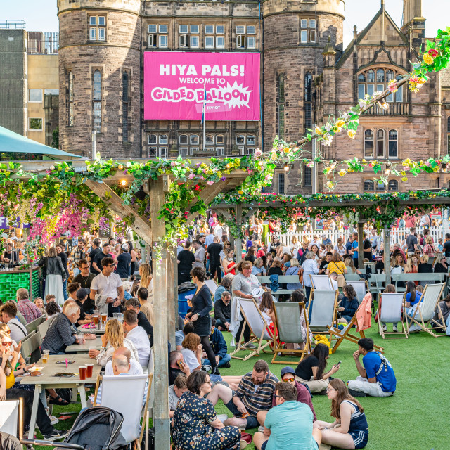 "Crowds in a hospitality area at the Edinburgh Fringe Festival, Edinburgh, Scotland" stock image