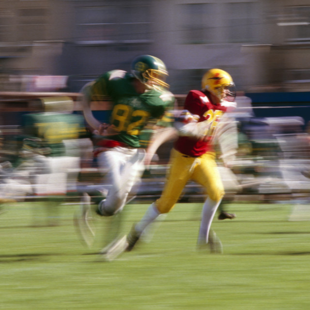 "American Football, a blur of activity" stock image