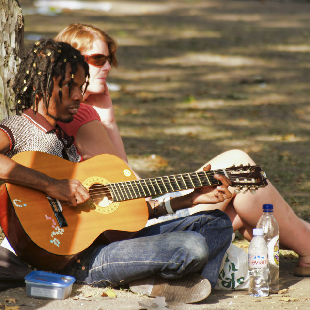 "STRUMMING IN LEICESTER SQUARE" stock image