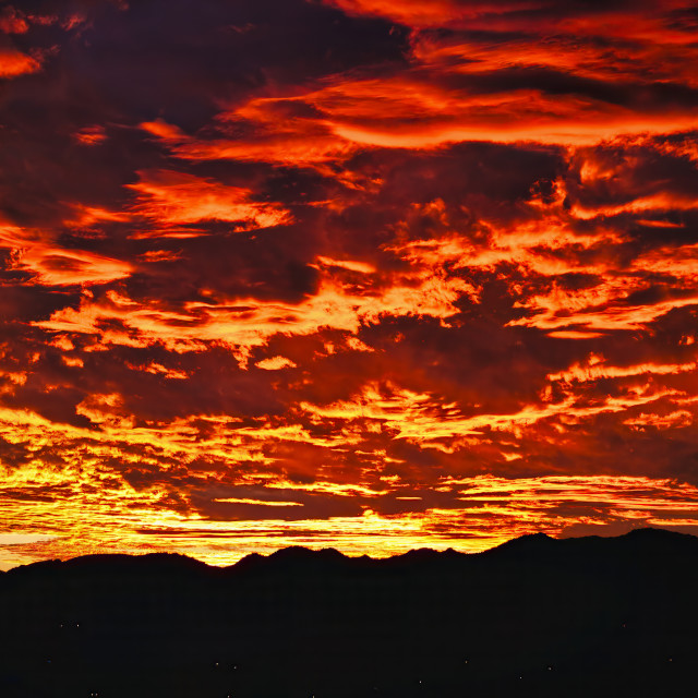 "FIRE ABOVE THE MOUNTAIN" stock image