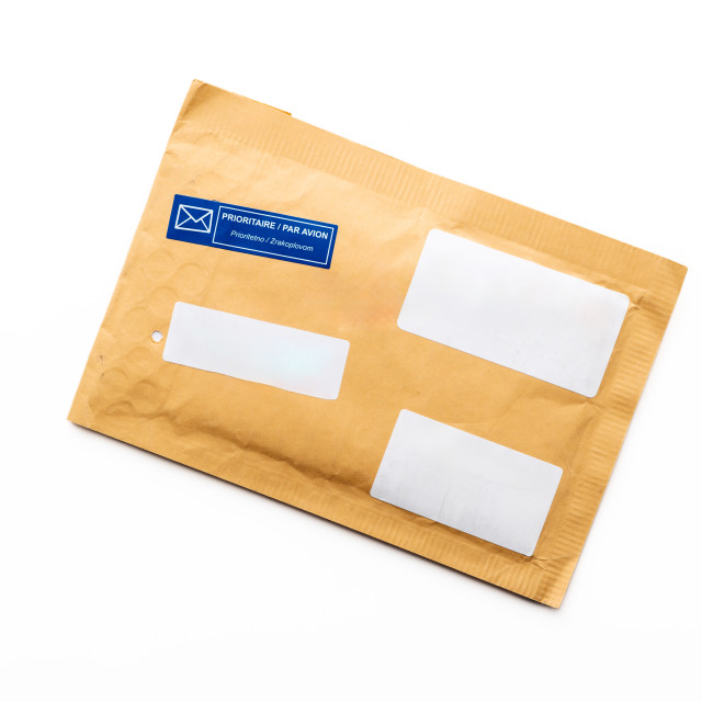 "Padded envelope top view isolated on white background, cardboard bag, package paper letter." stock image