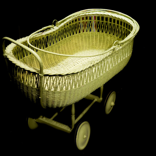 "an old carriage for a baby" stock image