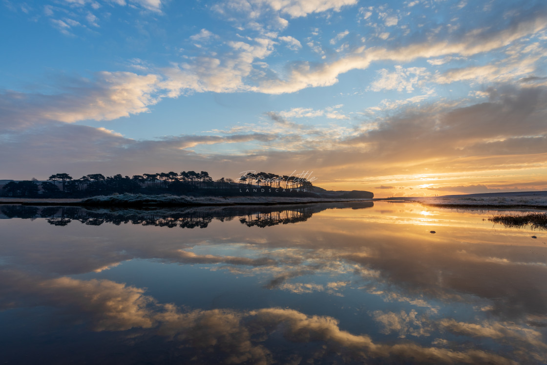 "New Years Sunrise at Budleigh Salterton" by Bruce Little - £20.00 "New Years Sunrise at Budleigh Salterton" stock image