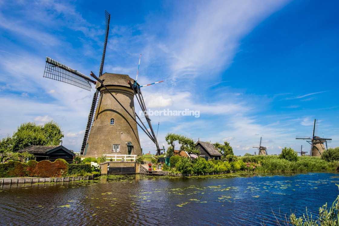 "Windmill in Unesco World Heritage Site, Kinderdijk, Holland, Netherlands." by robertharding - $62.31 "Windmill in Unesco World Heritage Site, Kinderdijk, Holland, Netherlands." stock image