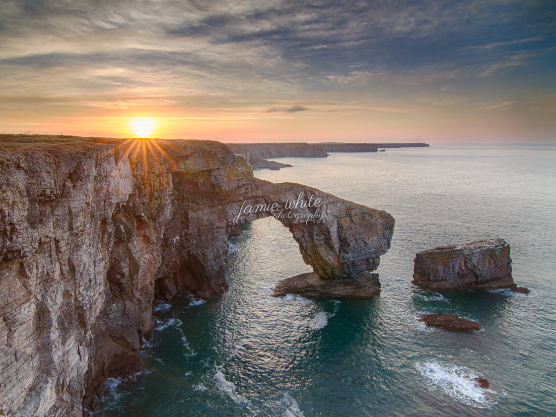 "The Green Bridge of Wales" by Jamie White - £10.00 "The Green Bridge of Wales" stock image