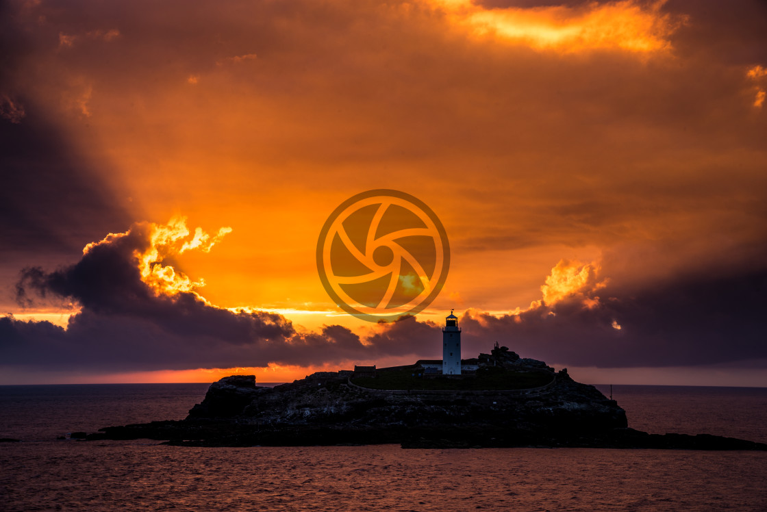 "Sunsetting at Godrevy Lighthouse" stock image