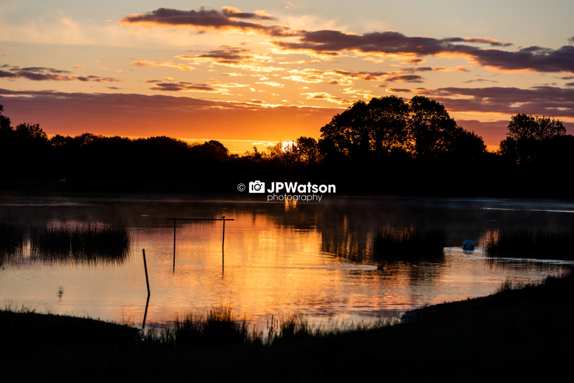 "Sun Rising at Staveley Nature Reserve" stock image