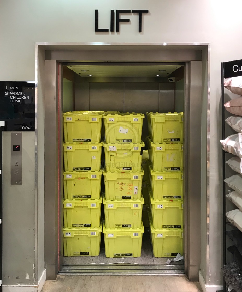 "Lift (elevator) completely full of boxes" by Mister 360 - £10.00 "Lift (elevator) completely full of boxes" stock image