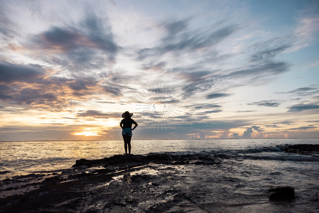 "Watching the sunset" stock image