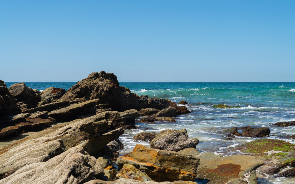 "A Rocky Section of the Beach" stock image