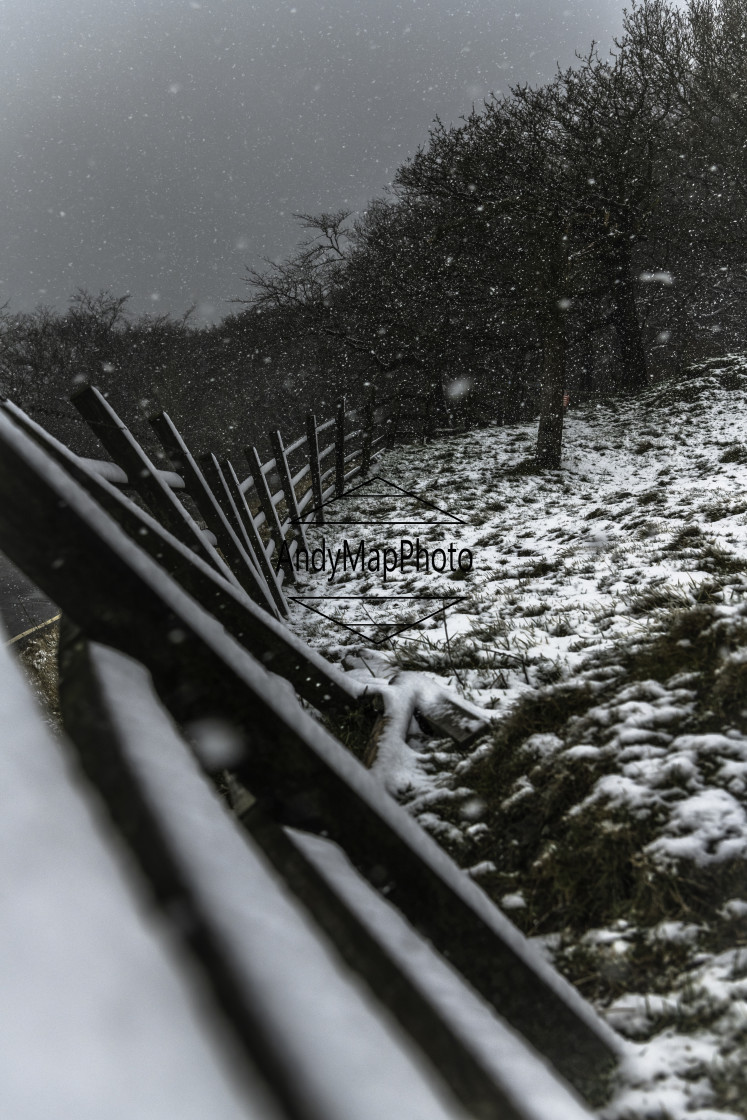 "Snow storm wonky fence" stock image