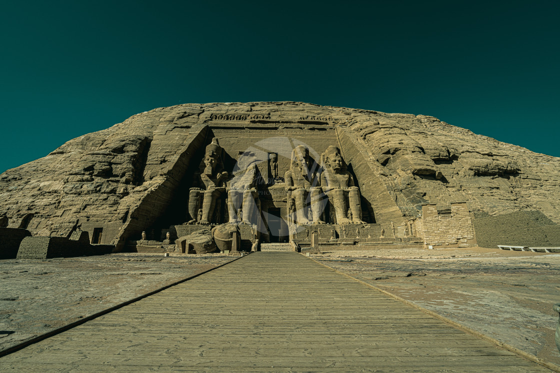 "Aswan landmarks. Abu Simbel temple in Aswan. Traveling girl. Ramses the..." stock image