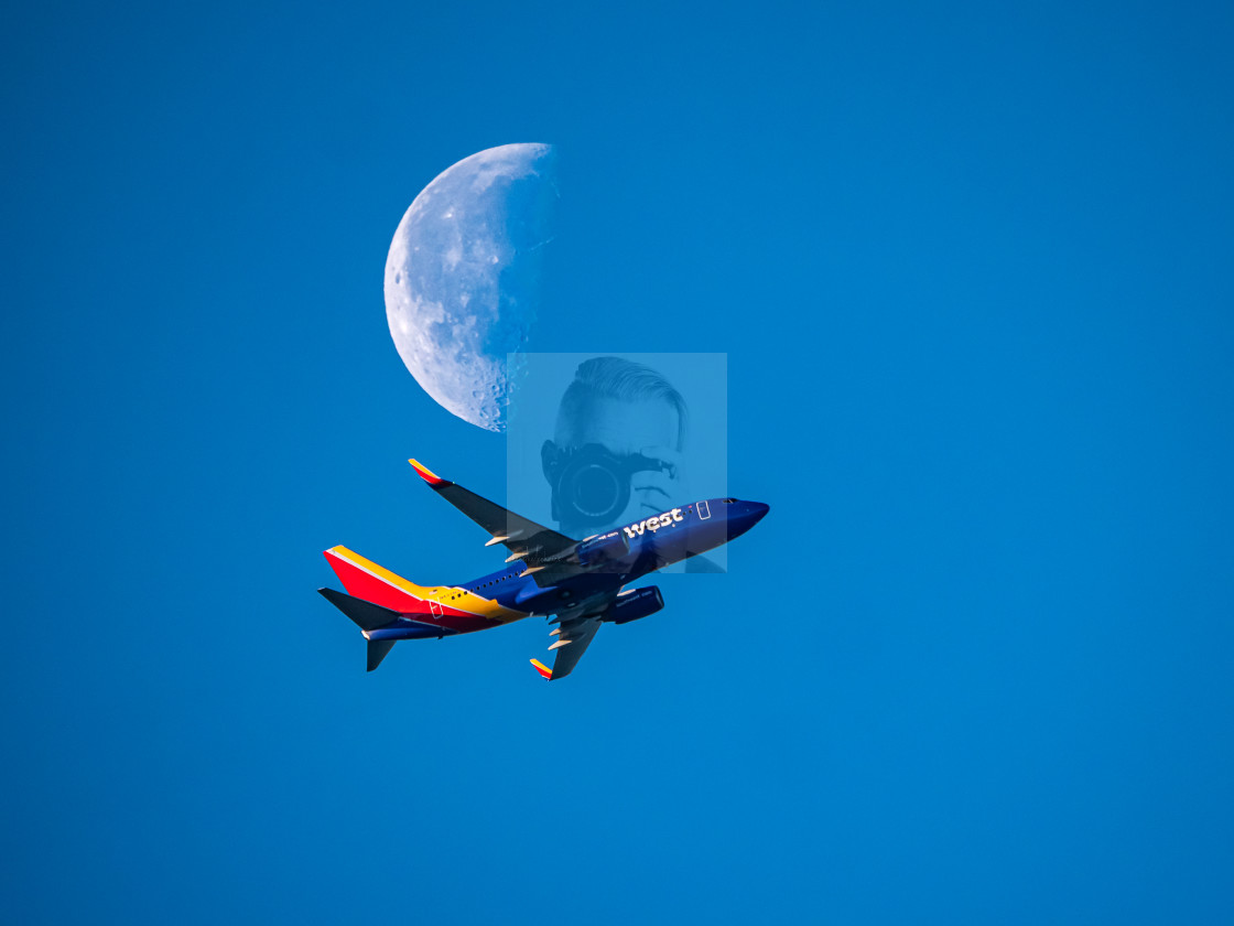 "Airplane and Half-Moon" stock image