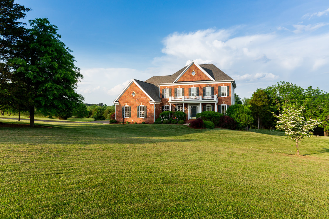 "Front elevation large single family home" stock image