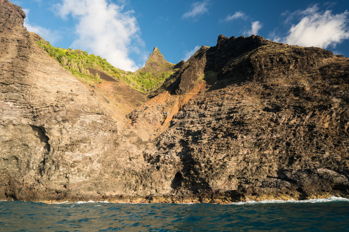 "Na Pali coastline taken from sunset cruise along Kauai shore" by Steve Heap - $8.21 "Na Pali coastline taken from sunset cruise along Kauai shore" stock image