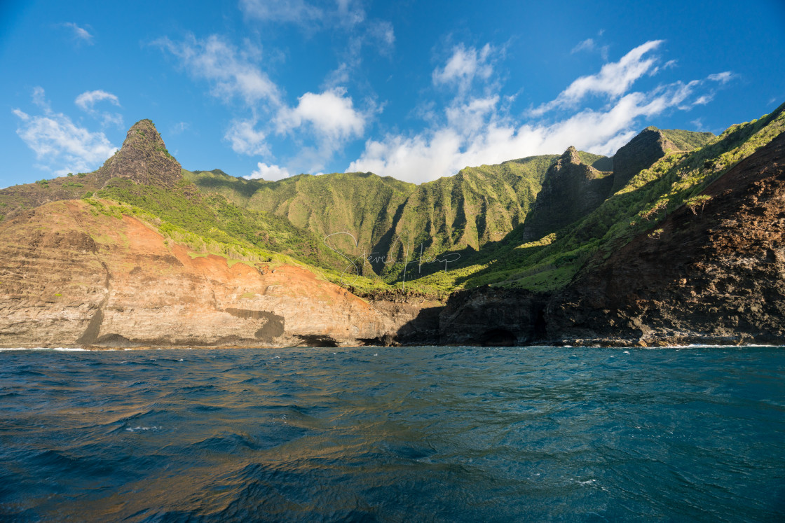 "Na Pali coastline taken from sunset cruise along Kauai shore" by Steve Heap - $8.25 "Na Pali coastline taken from sunset cruise along Kauai shore" stock image