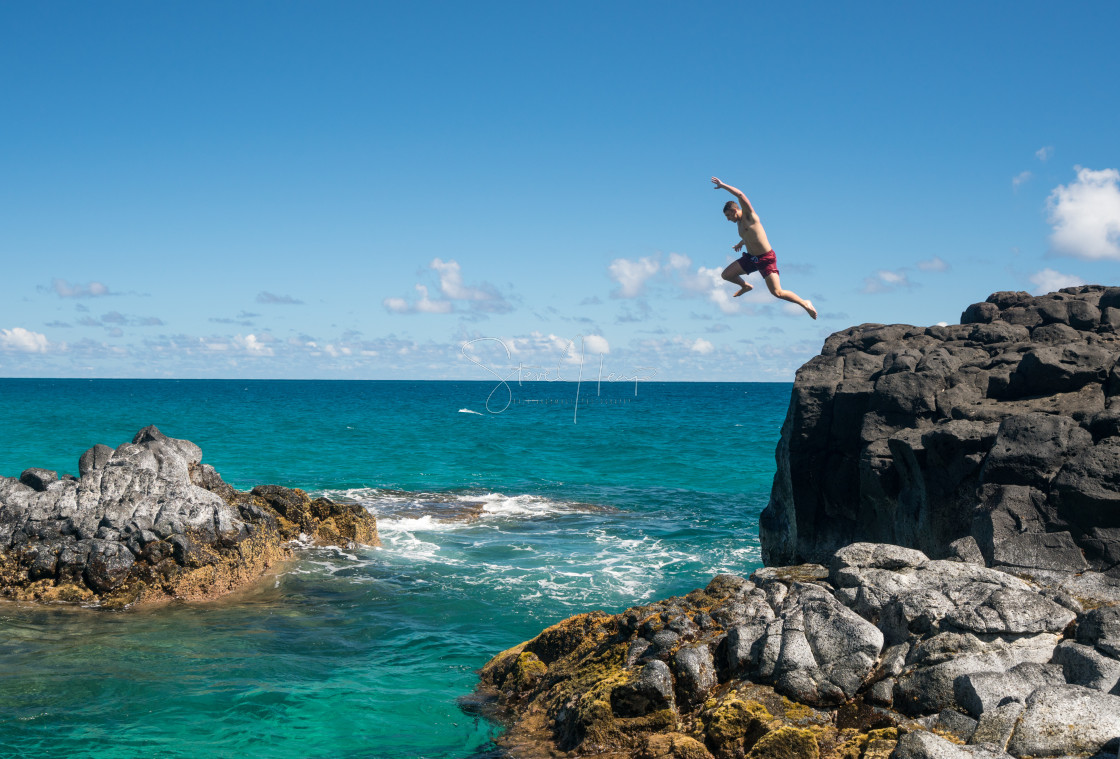 "Fit young man jumps into ocean at Lumahai beach Kauai" by Steve Heap - $8.21 "Fit young man jumps into ocean at Lumahai beach Kauai" stock image