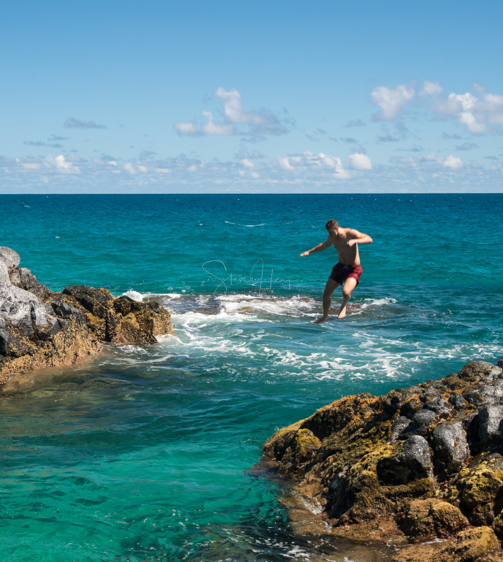 "Fit young man jumps into ocean at Lumahai beach Kauai" by Steve Heap - $8.21 "Fit young man jumps into ocean at Lumahai beach Kauai" stock image