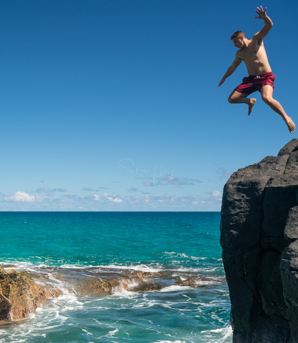 "Fit young man jumps into ocean at Lumahai beach Kauai" by Steve Heap - $8.21 "Fit young man jumps into ocean at Lumahai beach Kauai" stock image