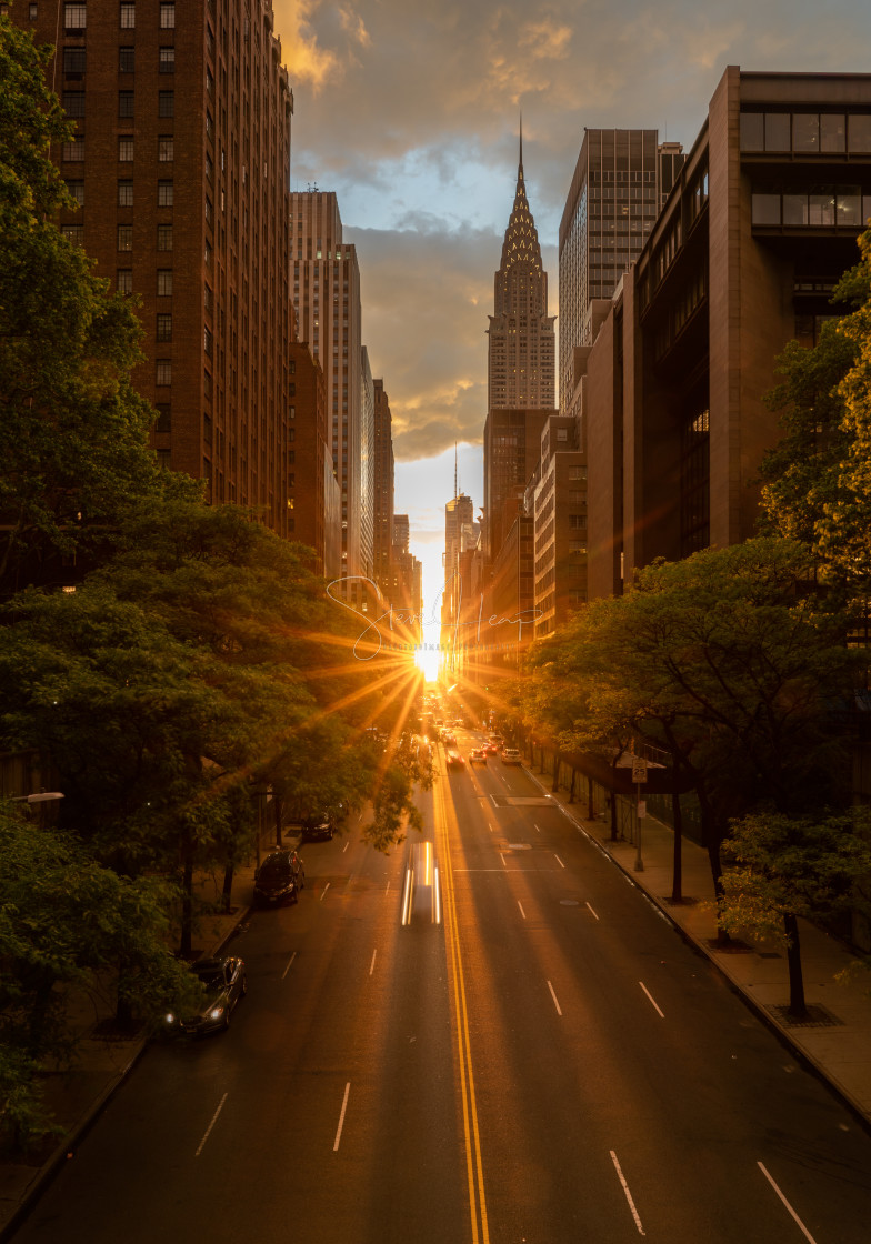 "Manhattanhenge when the sun sets along 42nd street in NY" stock image