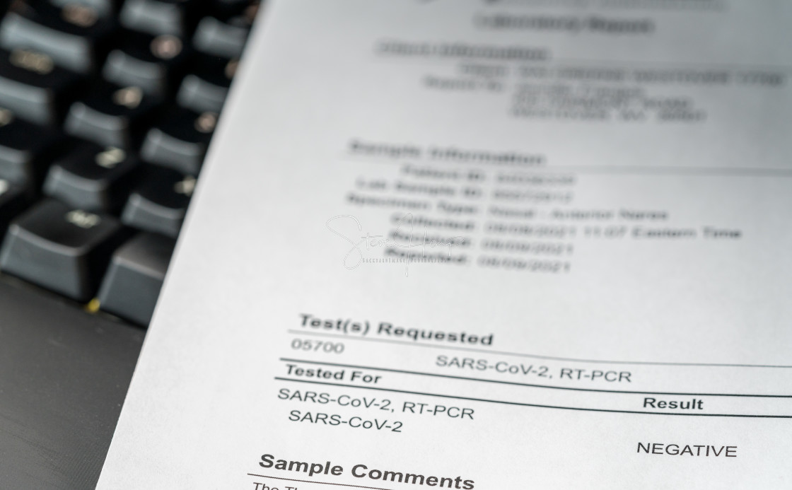 "Printout showing result of PCR test for Covid-19 as negative" stock image