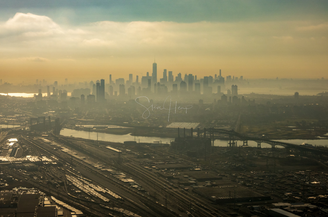 "Misty polluted view of New York City and New Jersey from airplane" stock image