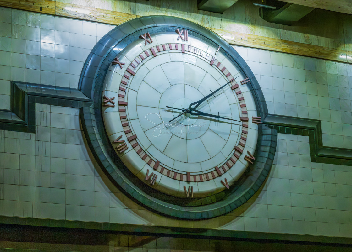 "Large clock on wall in Westlake link light rail station in Seattle" by Steve Heap - $8.21 "Large clock on wall in Westlake link light rail station in Seattle" stock image