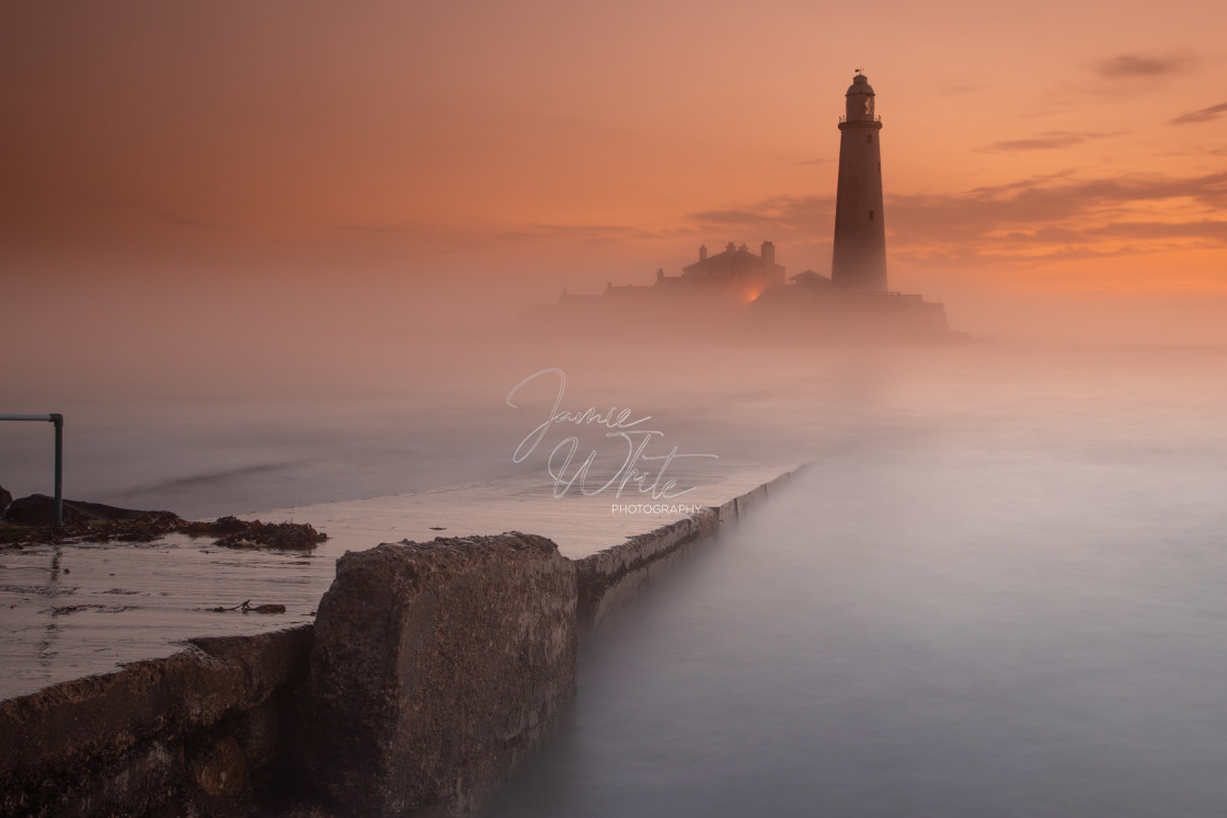 "Misty dawn at St. Mary's Lighthouse" stock image