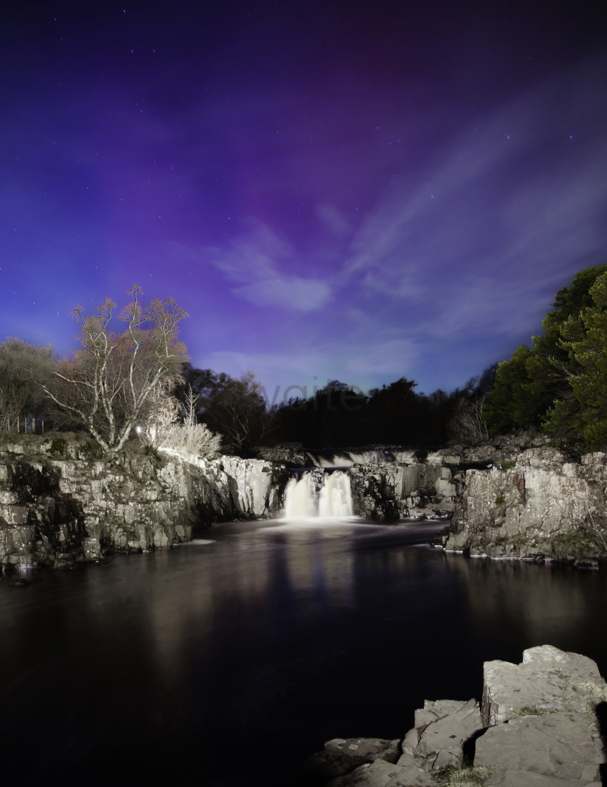 "Aurora Waterfall." stock image