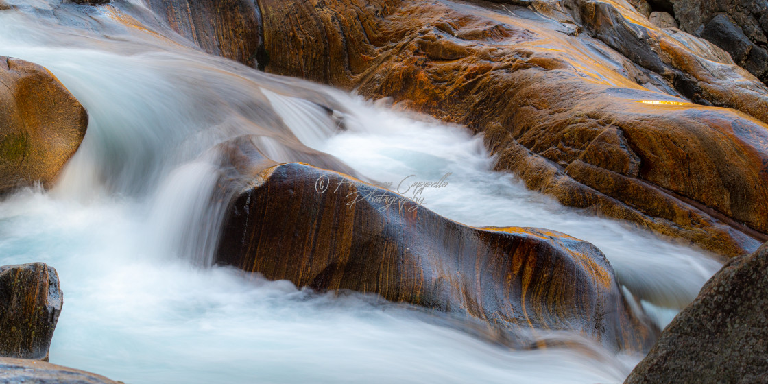 "colorfull stones in the river verzasca" by Francesco Cappello Photography - $48.79 "colorfull stones in the river verzasca" stock image