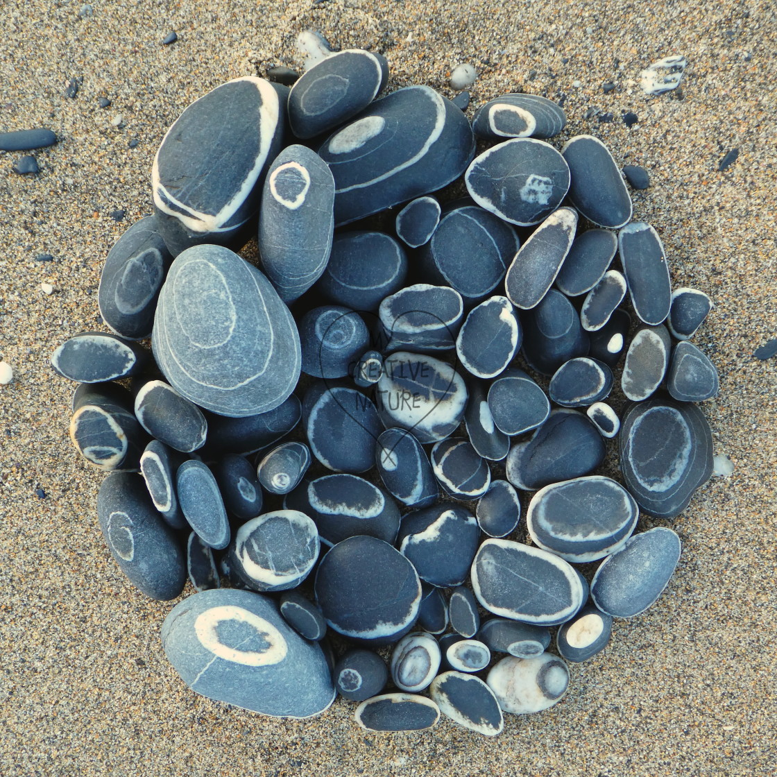 "beach pebble circles" stock image