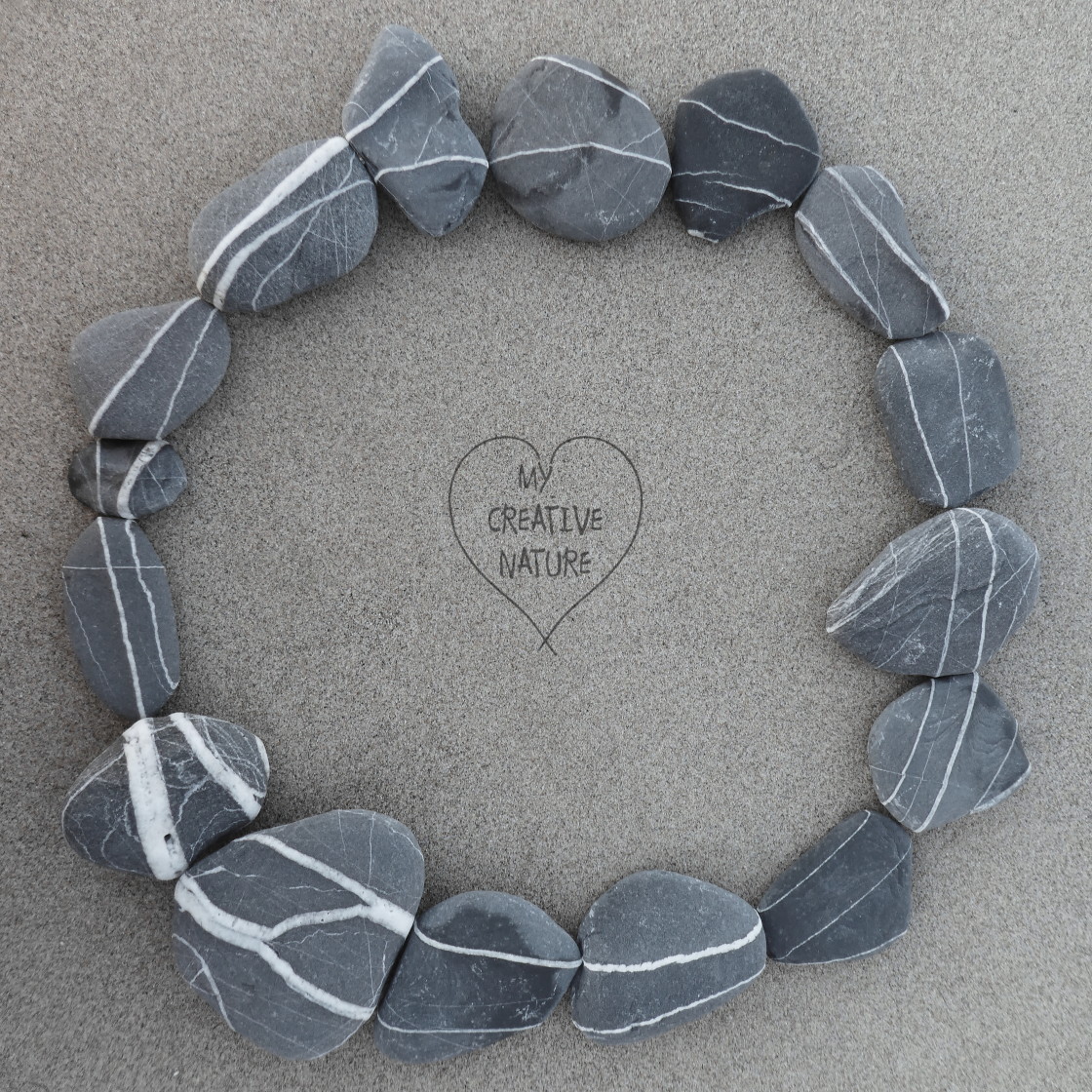 "double circle from beach stones" by Lucia Pec - £10.00 "double circle from beach stones" stock image
