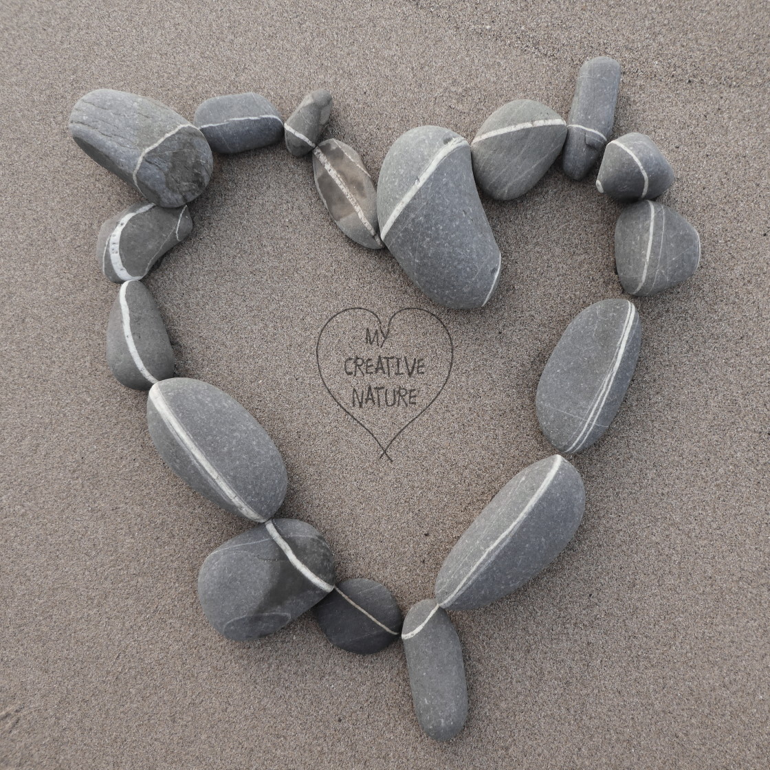 "heart from beach stones" stock image