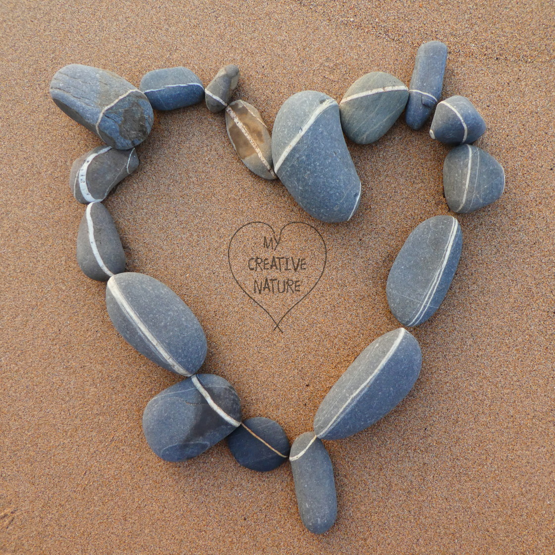 "heart from beach stones" by Lucia Pec - $12.25 "heart from beach stones" stock image