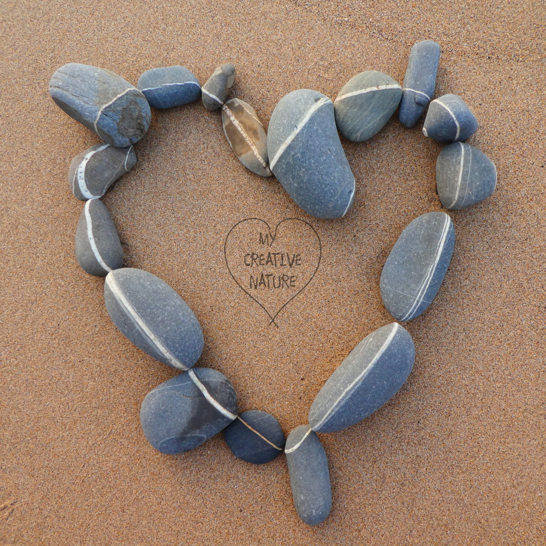 "heart from beach stones" stock image